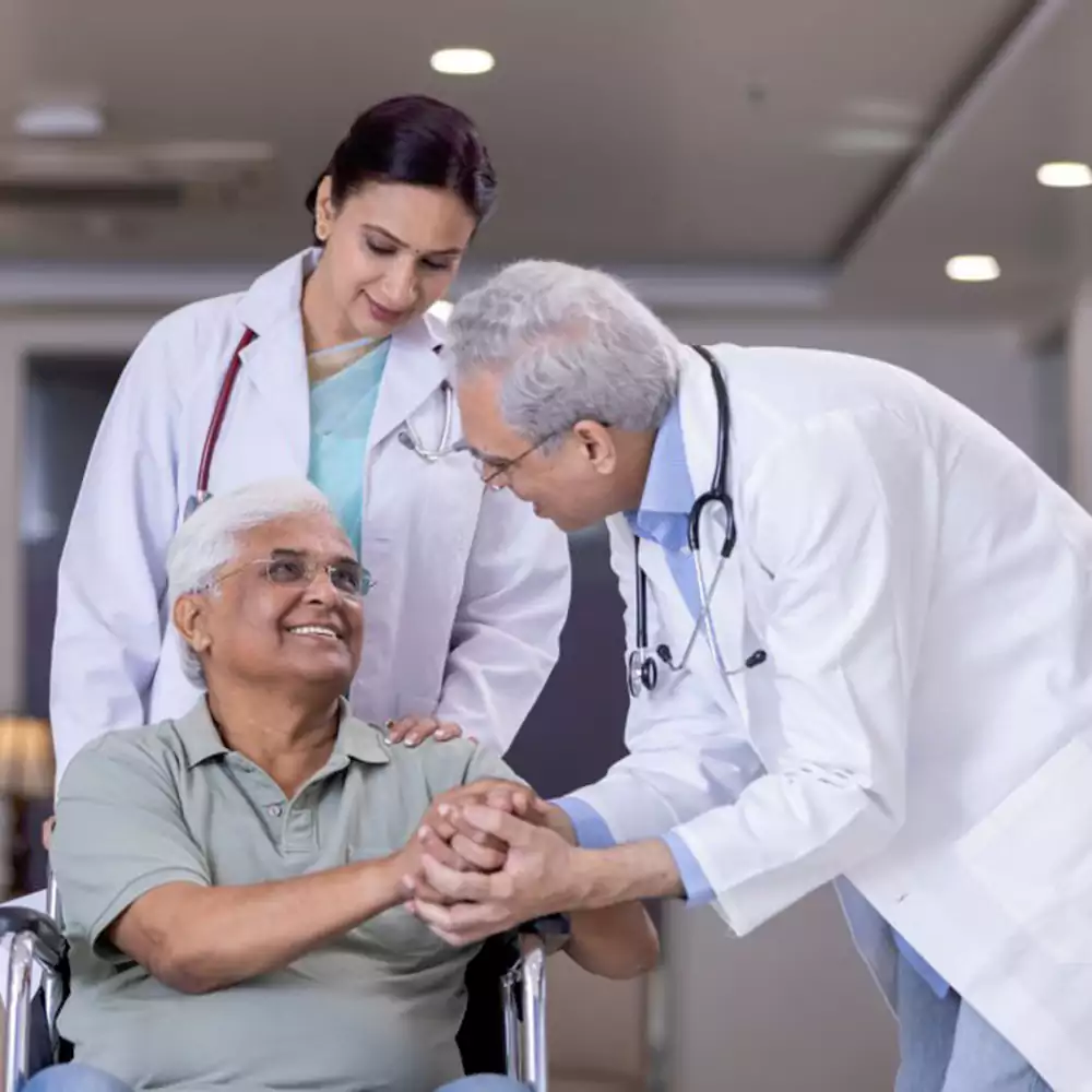 doctors_comforting_a_disabled_elderly_patient